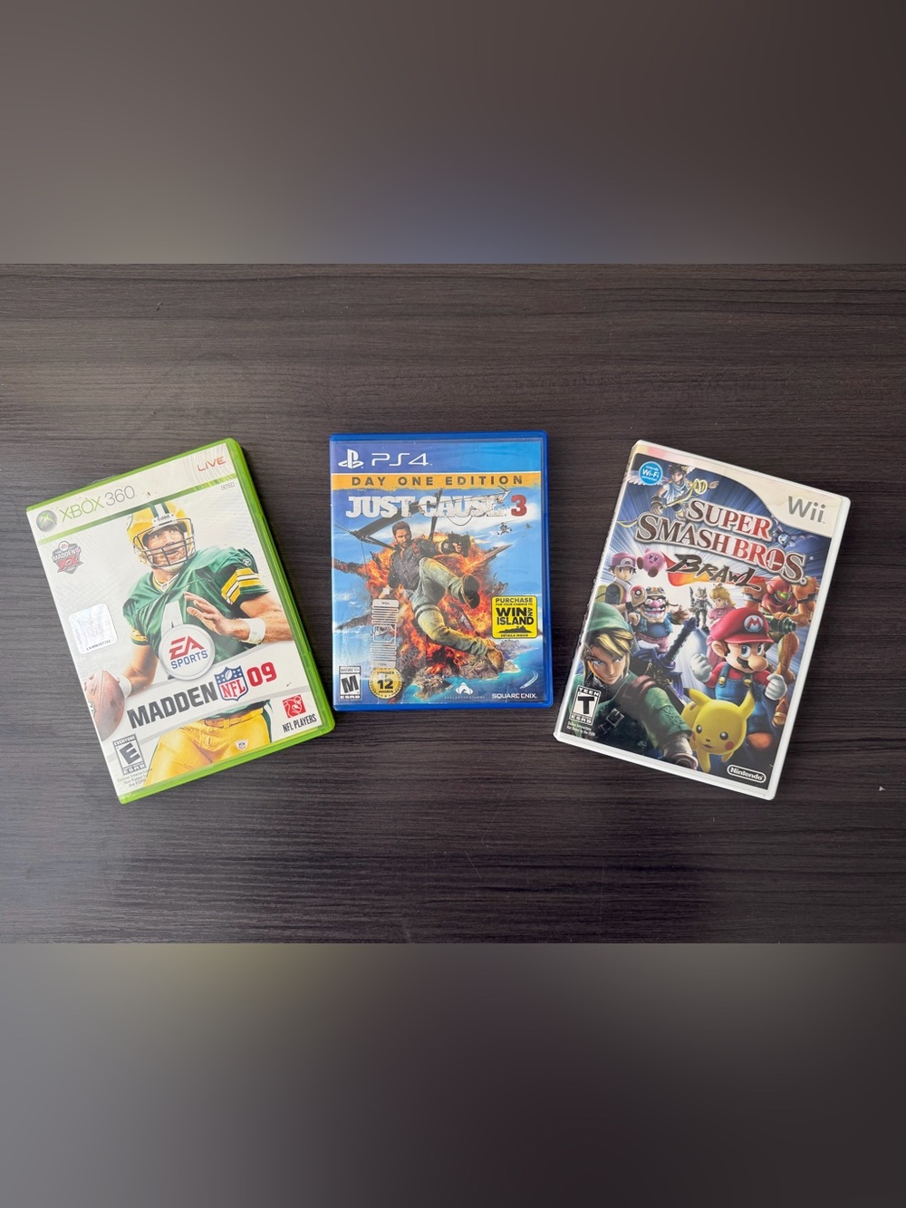 Wii & PS4 Games Lot – Madden 09, Just Cause 3 + Smash Bros Brawl Case (No Disc)